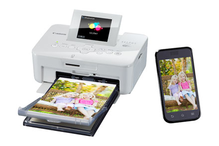 ���������� �����������  Canon Selphy CP910 (�����)